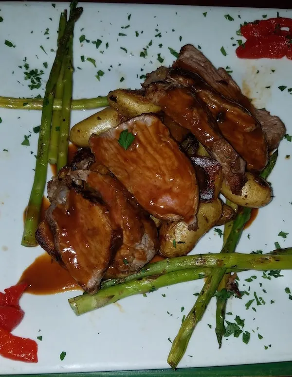 Glazed pork tenderloin with asparagus and potatoes at Michael's Trattoria Wallingford CT